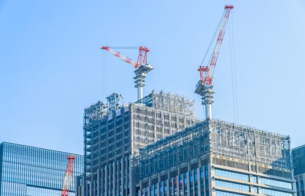 Crane construction building with blue sky background